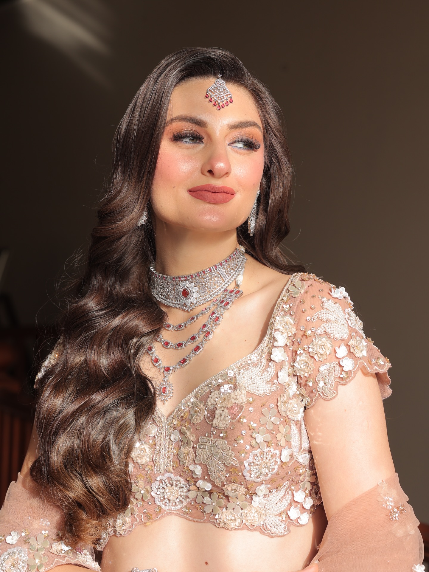 Bride in royal blue lehenga at palace venue